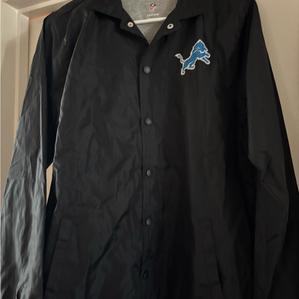 Youth Black Windbreaker with Blue Logo